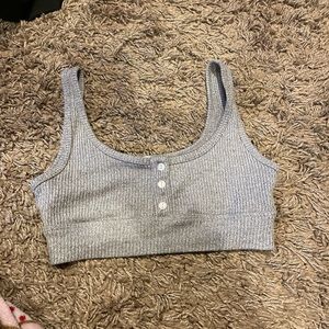 small grey crop top with adjustable buttons